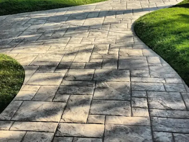 Well-graded walkway with drainage systems ensuring effective water management