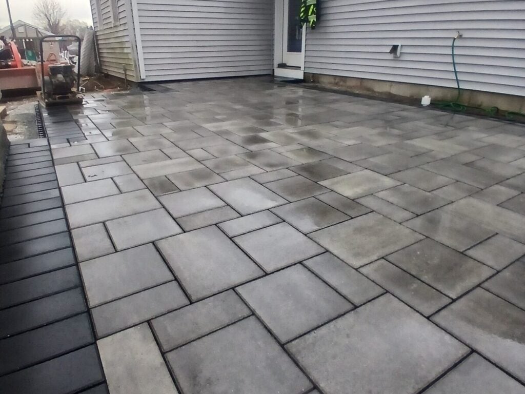 After &mdash; paver patio, walkway and seat wall installation in Billerica MA by Cut Above Landscaping